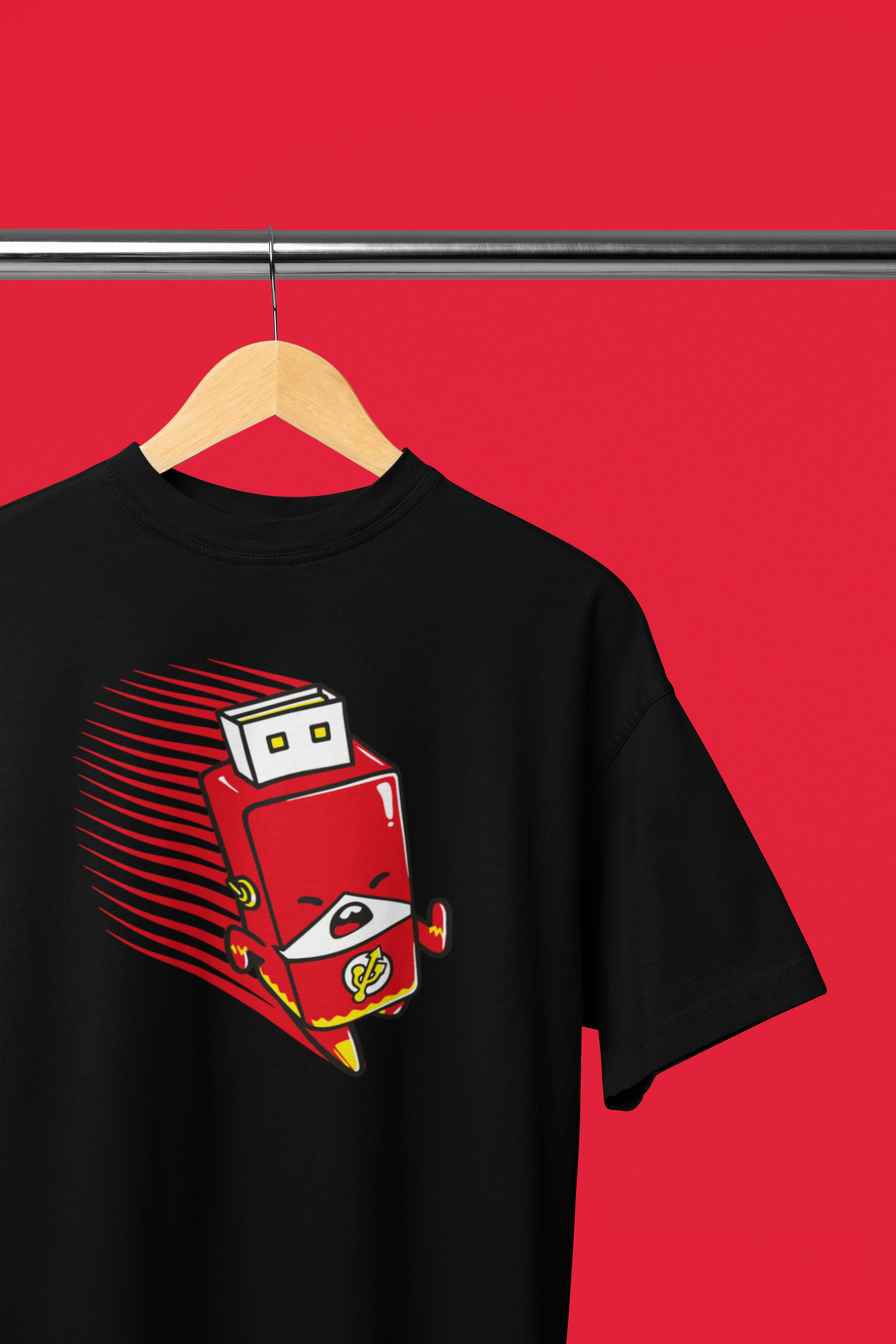 Black t-shirt with a red and yellow graphic on a hanger against a red background