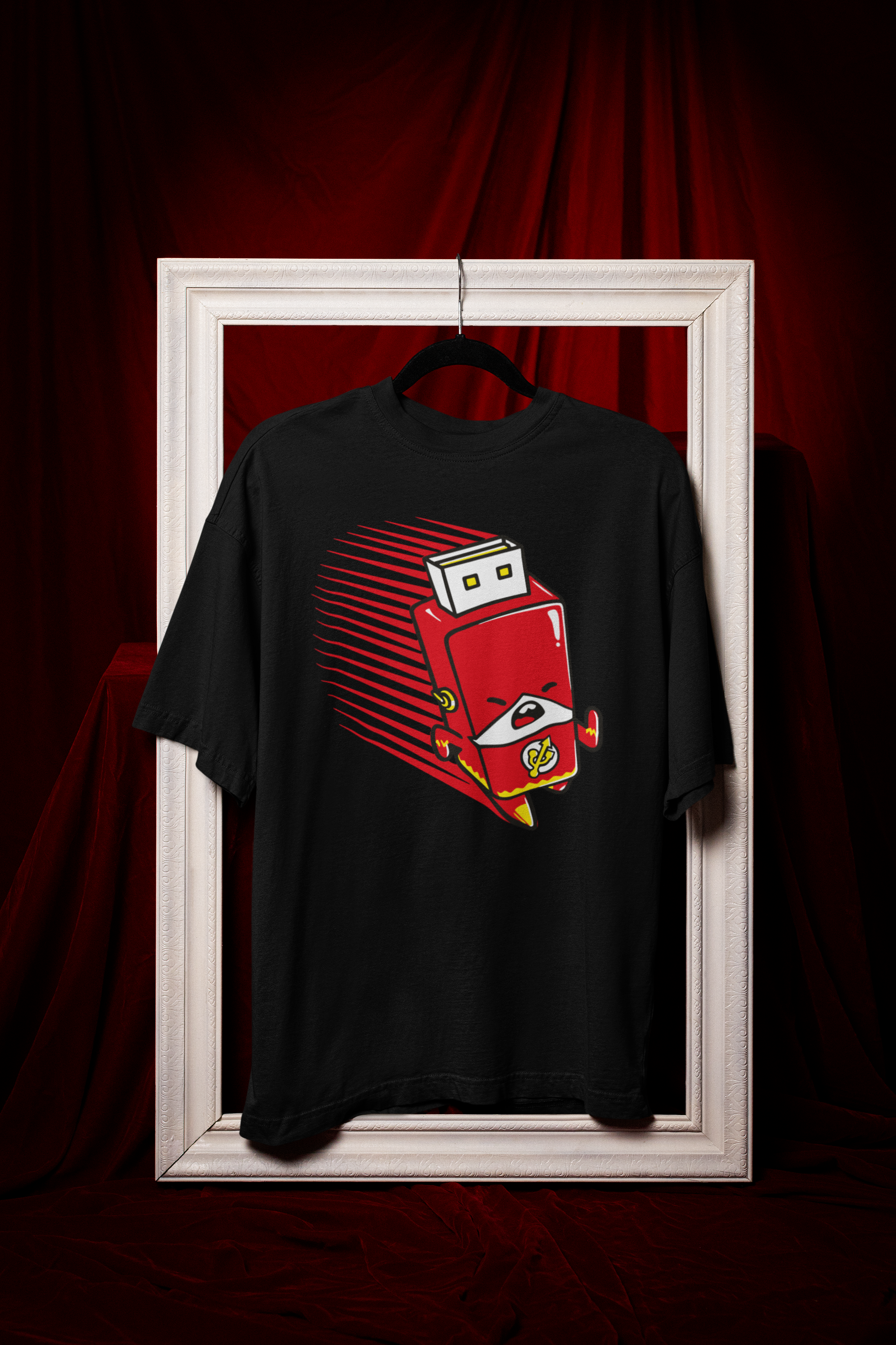 Black t-shirt with a red robot graphic on a dark background